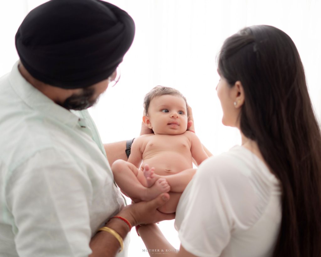 Newborn Professional Photoshoot With Parents